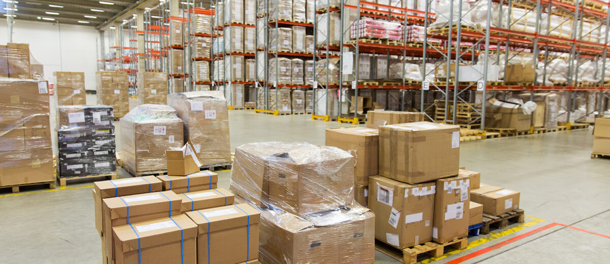 cargo boxes storing at warehouse shelves