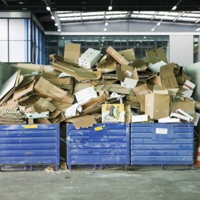©Milena Boniek/6PA/MAXPPP ; Bins overflowing with cardboard in recycling center