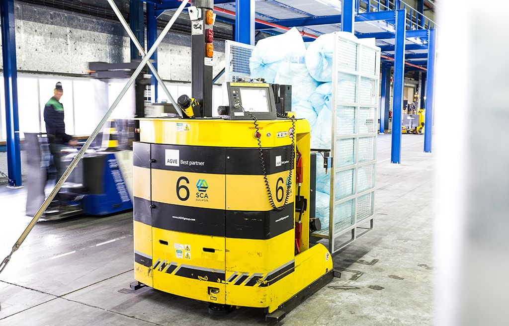 Agv Forklifts Optimize Logistics At Large Warehouse Orwak